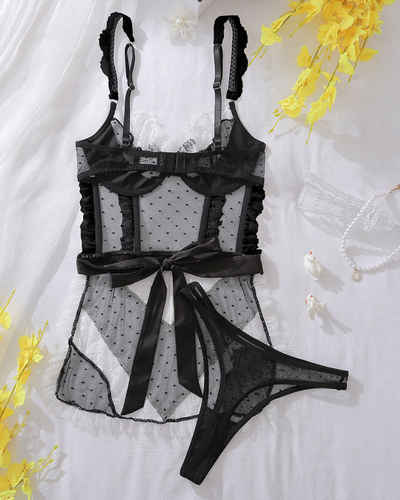 Black and white sheer mesh lingerie set with black lace bra, ruffle skirt, and thong
