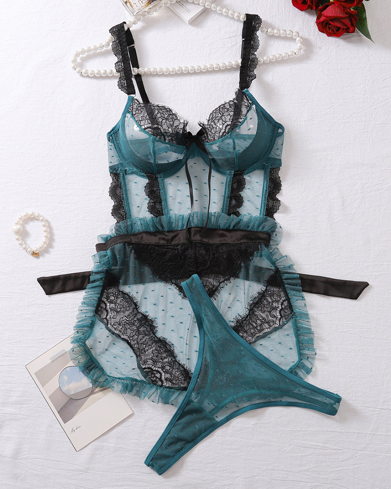 Turquoise mesh lingerie set with black lace bra, ruffle trim skirt, and matching thong