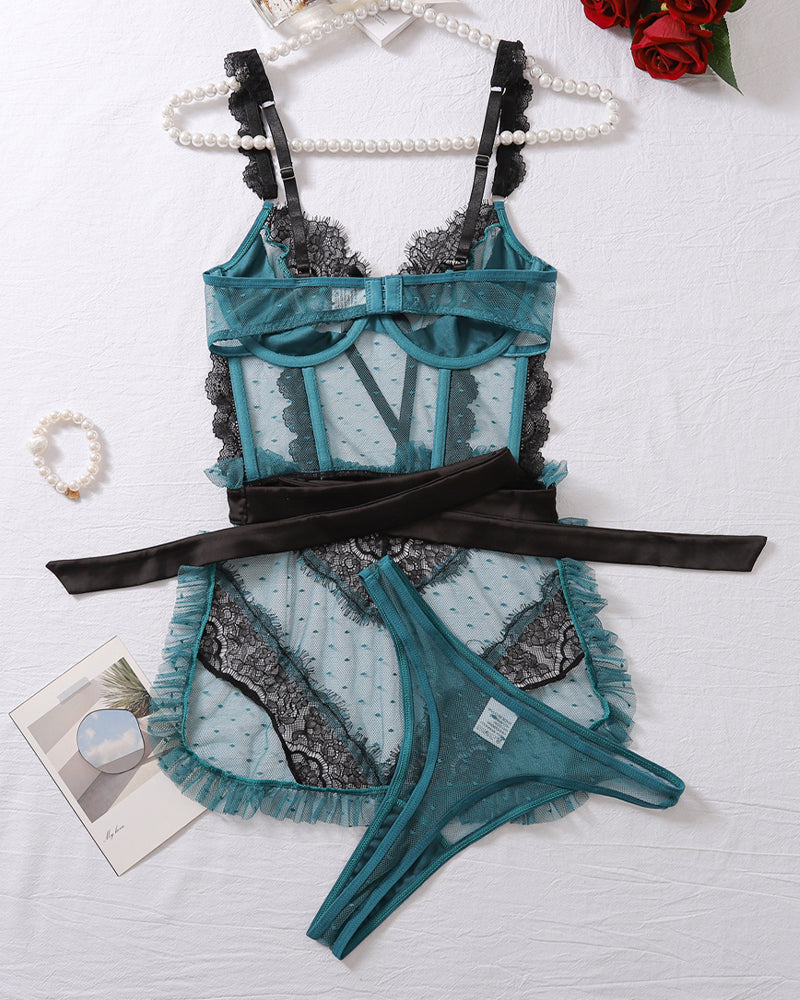 Turquoise mesh bra and thong lingerie set with black lace accents and ruffled skirt