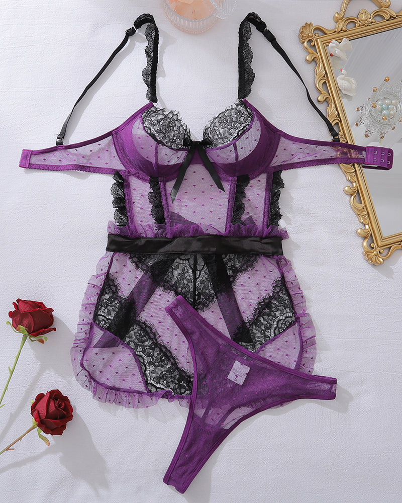 Purple mesh lingerie set with black lace bra, ruffle skirt, and matching thong