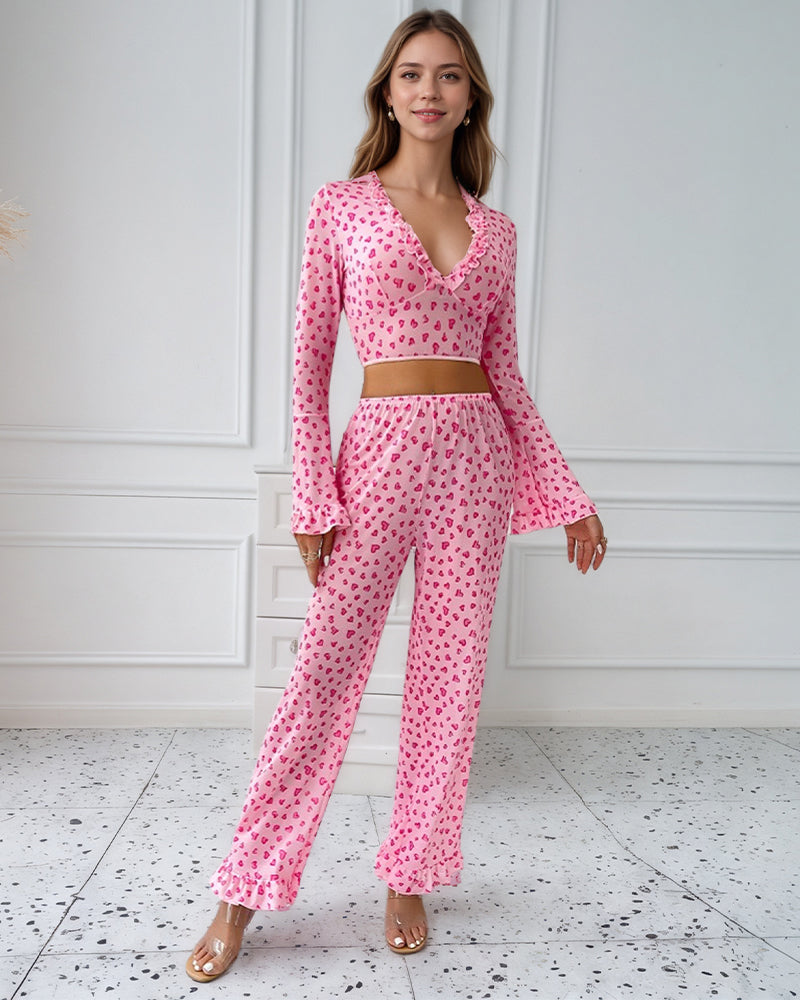 Pink heart-print long-sleeve pajama set with ruffled neckline and flared cuffs