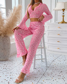 Pink heart-print pajama set with ruffled V-neck crop top and wide-leg pants