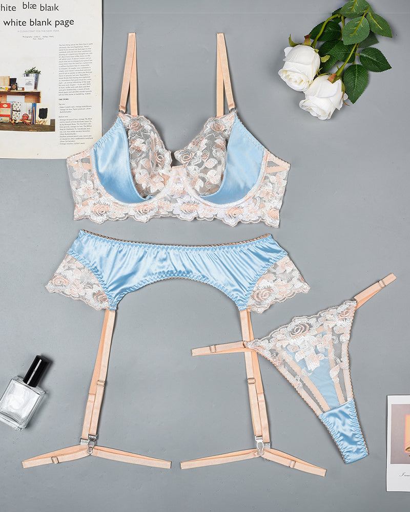 Light blue lingerie set: lace push-up bra, garter belt, lace thong, suspender straps