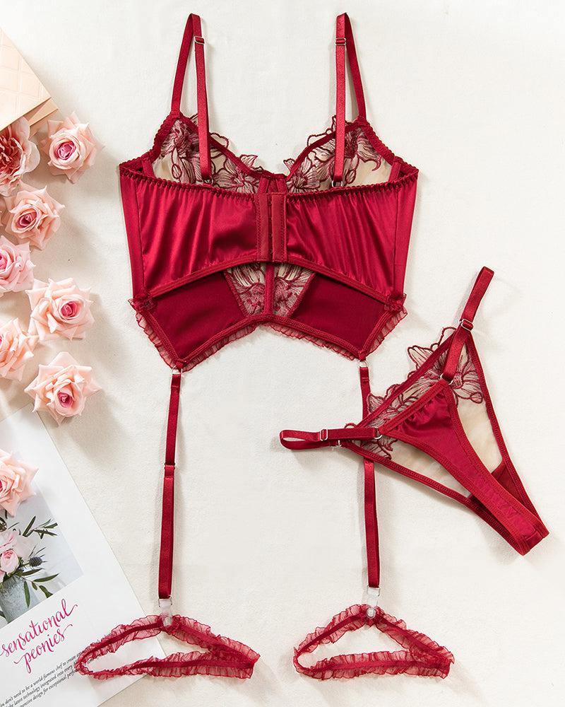 Wine red embroidered bustier-style bra with garter straps and matching thong