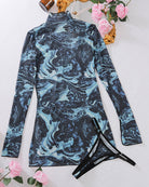 Blue and black marbled mesh mini dress, mock neck, long sleeves, tied side hem