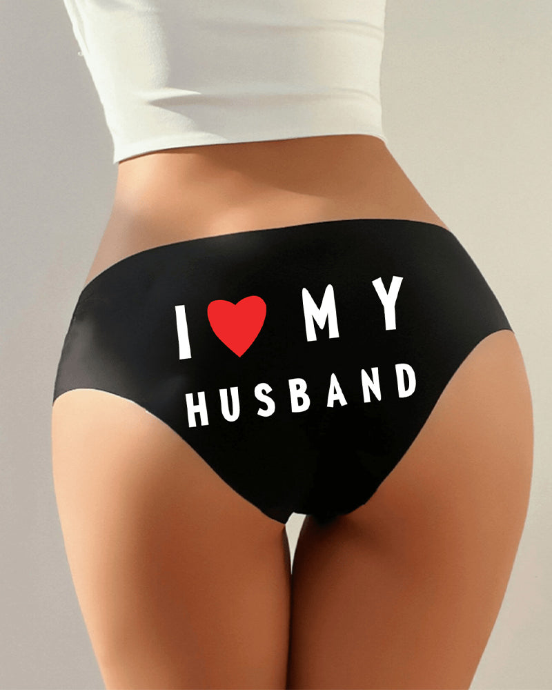 Black bikini-style panties with heart and “I ♥ MY HUSBAND” on front
