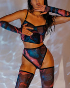 Watercolor mesh lingerie set showing bralette, high-waist briefs, arm gloves and thigh-high hold-ups