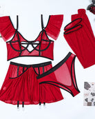 Wine red lingerie set flat lay: heart cutout bra, tulle skirt, garter stockings, panty