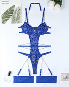 Blue lace embroidered bodysuit with chain straps, open back design, and garter bands