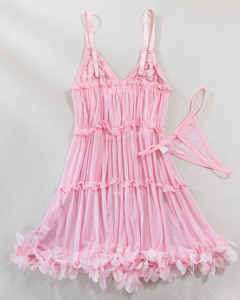 Pink tiered babydoll dress with thin straps, ruffled bust, and matching thong