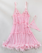 Pink tiered babydoll dress with thin straps, ruffled bust, and matching thong