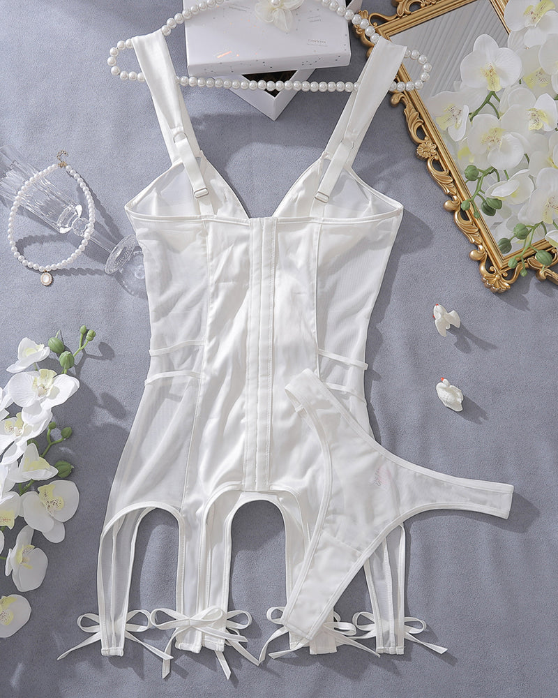 White satin mini dress with corset seams and ribbon bow hem, skirt cutouts