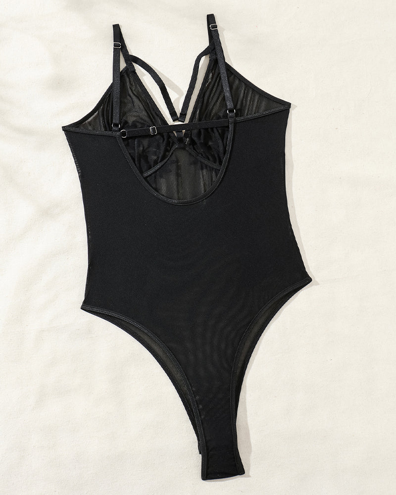 Black sheer mesh bodysuit with adjustable straps and scoop neckline, thong cut