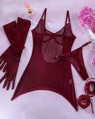 Wine red mesh bodycon dress, sheer gloves, and matching garter straps laid flat