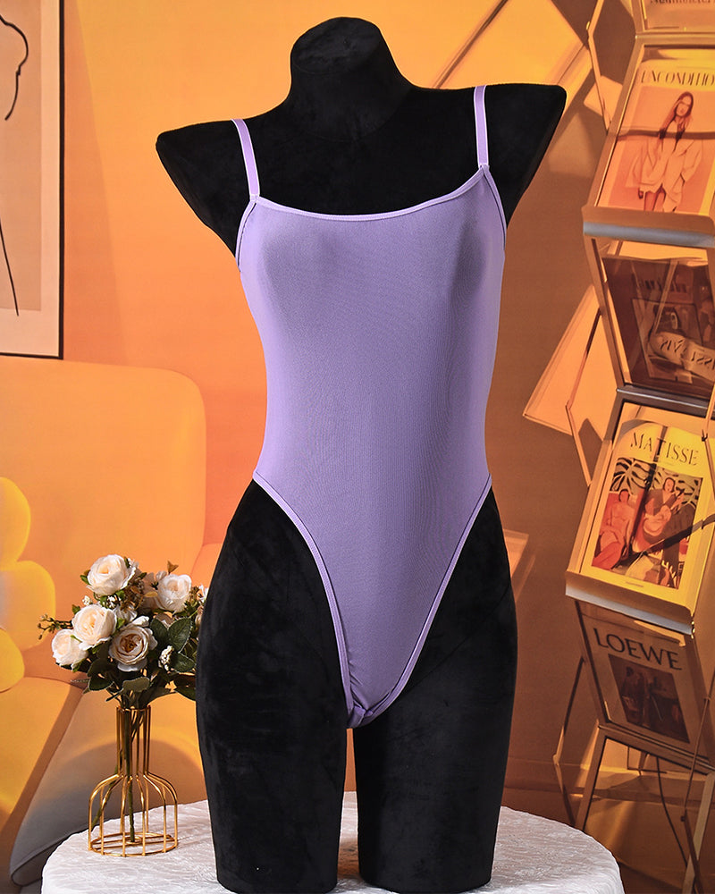 Sheer mesh bodysuit with high-cut leg and thin straps, lilac/purple color.