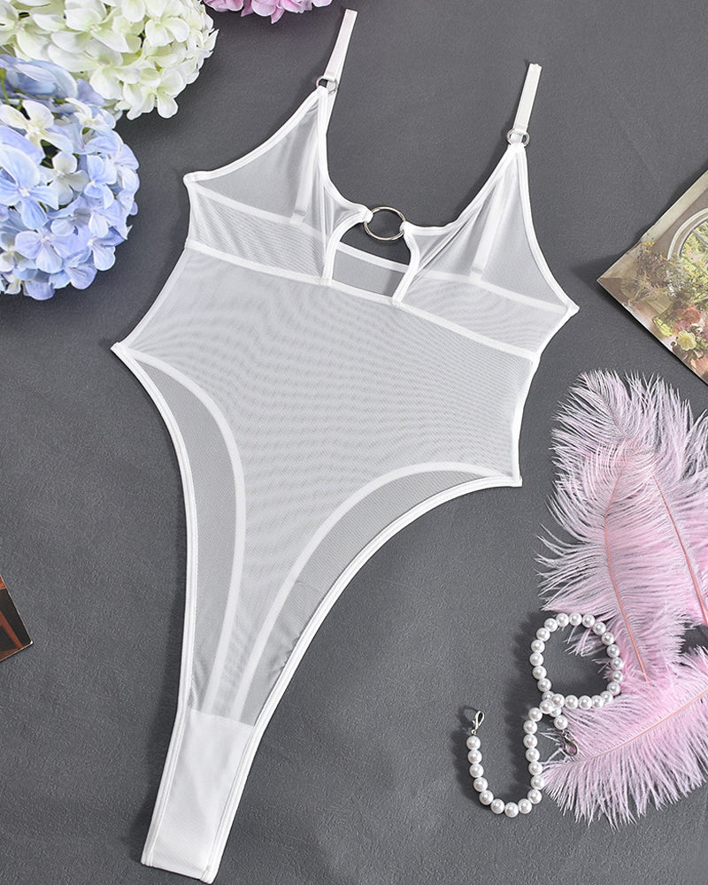 White hollow mesh sheer bodysuit with circular chest cutout and long thong back