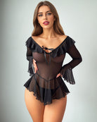 Black off-shoulder ruffle mini dress with long sheer sleeves and tie neckline