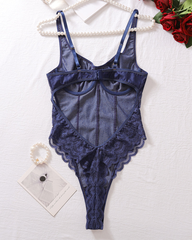 Blue lace denim backless bodysuit, back view, with cross-strap design and lace edges