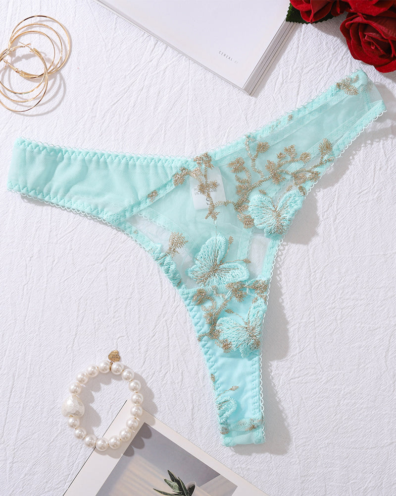 Light green embroidered thong panty with lace-up sides and scalloped lace edging