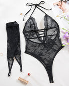 Black sheer lace bodysuit and matching long gloves, floral embroidery, drawstring straps.