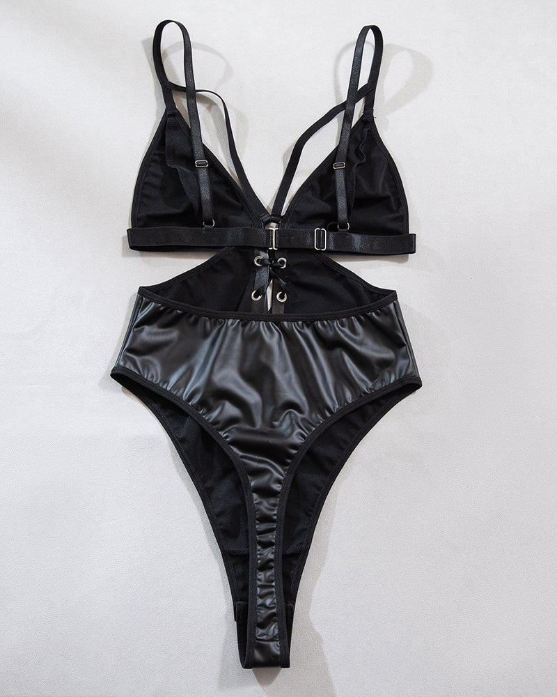 Black PU bodysuit with adjustable bra straps, lace-up center panel, high-cut legs