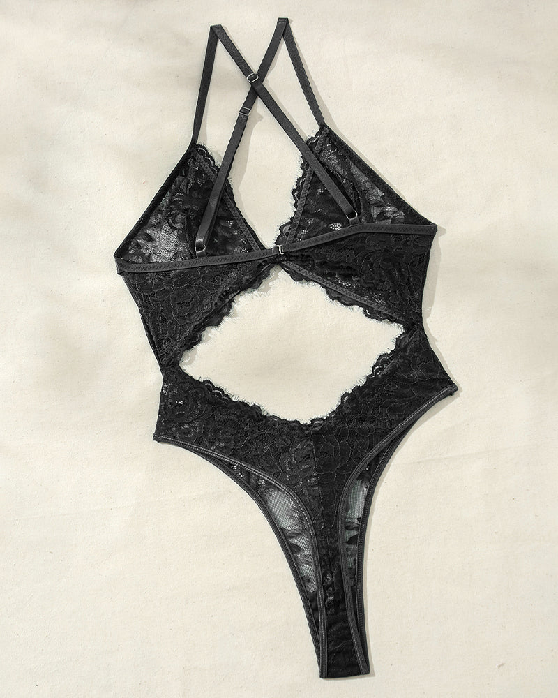 Black lace hollow bodysuit with crisscross straps and wide back cutout