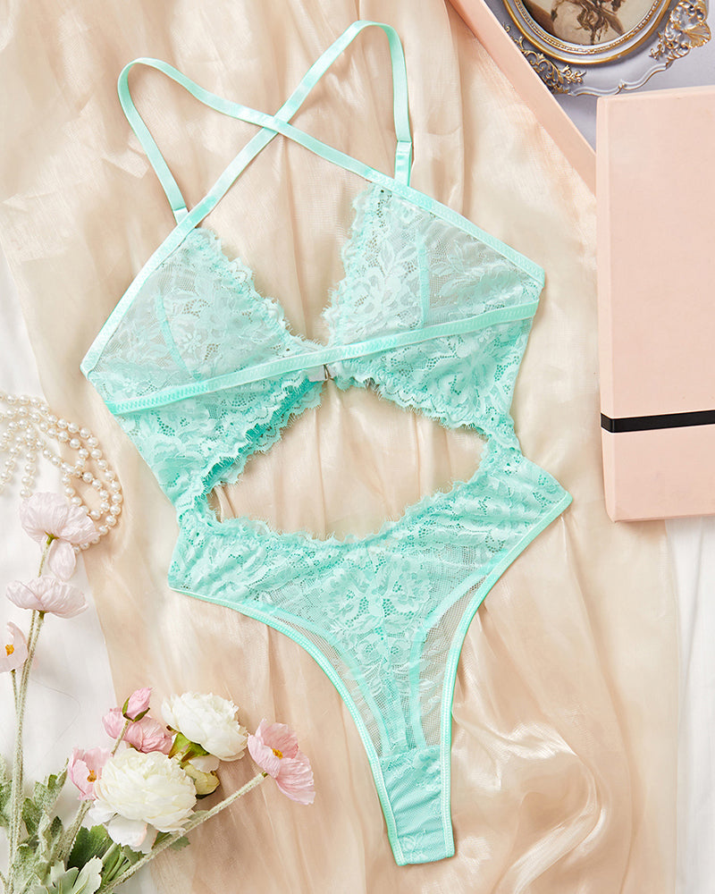 Mint green lace backless bodysuit with crisscross straps and hollow cutout