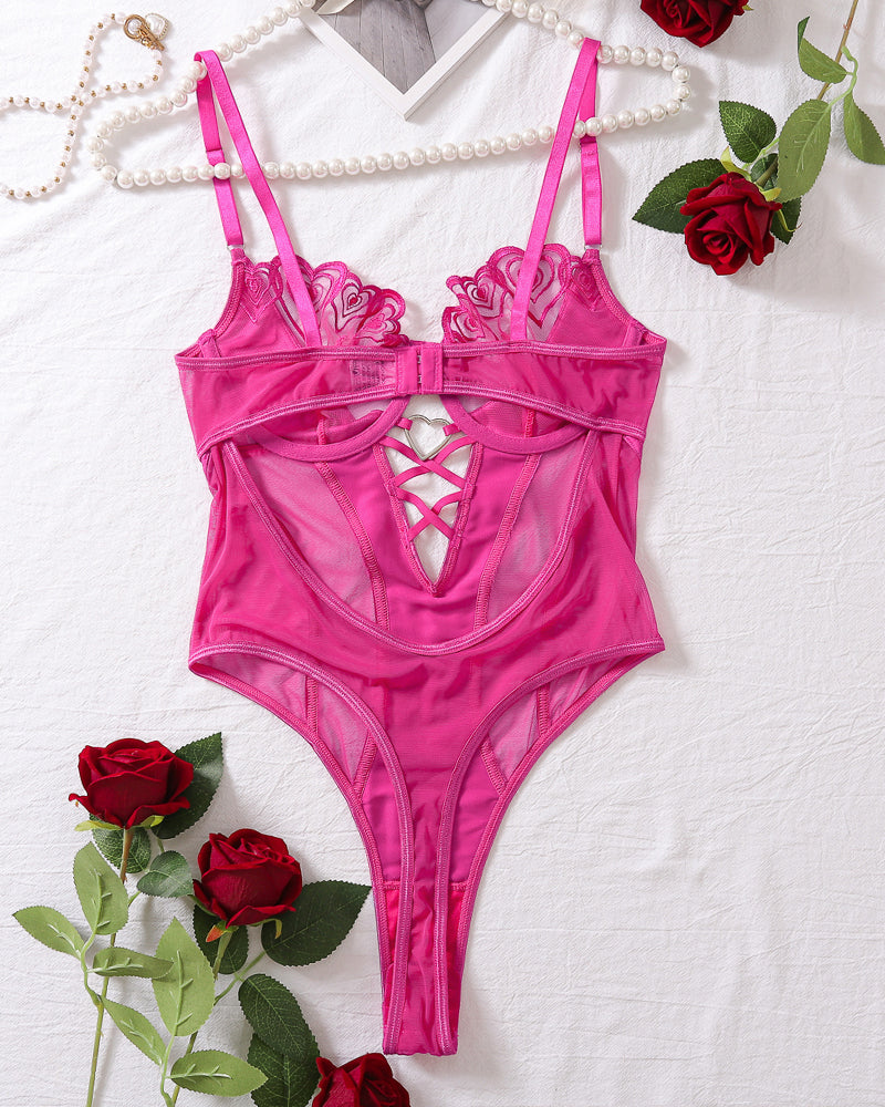 Rose red bodysuit with heart-embroidered cups and central lace-up cutout