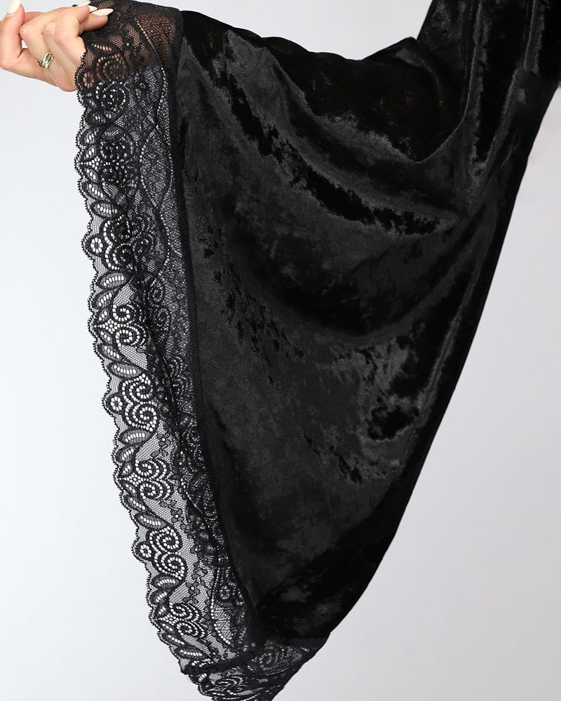 Black velvet robe with lace trim along hem and edge detail