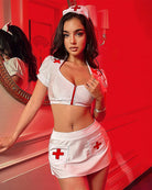 White nurse-style crop top and mini skirt set with red cross patches, plus headband