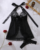 Black lace babydoll nighty with open-front cut, long bow straps, and lace trim