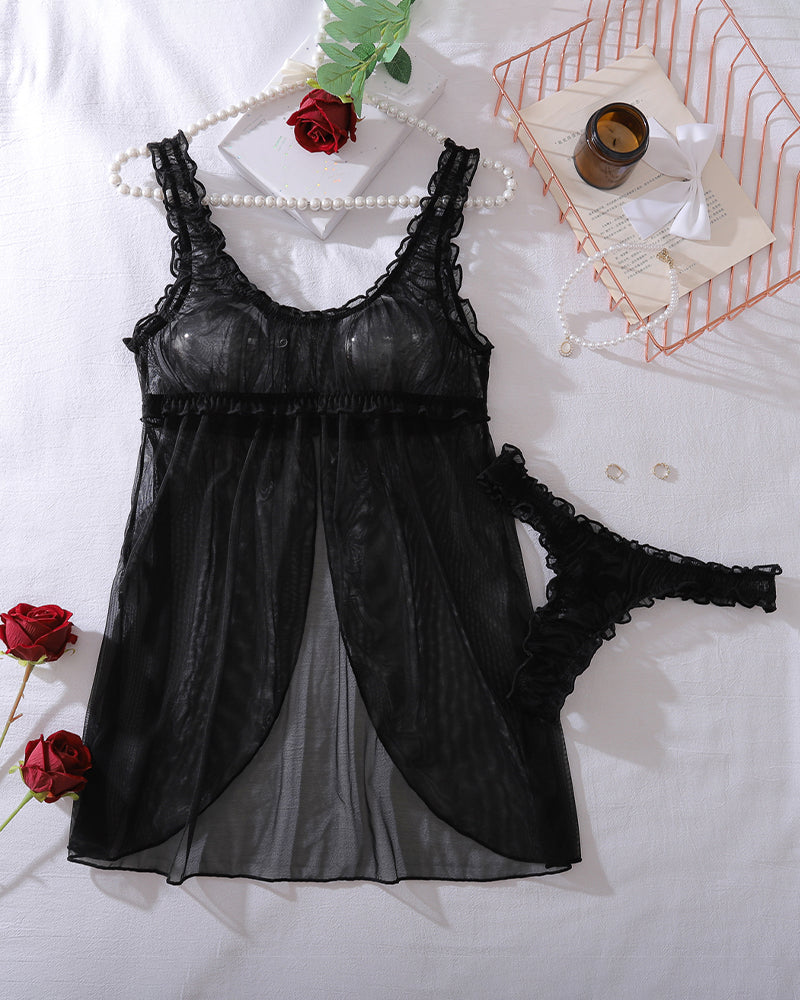 Black sheer babydoll night dress with lace straps and matching lace thong, flat lay
