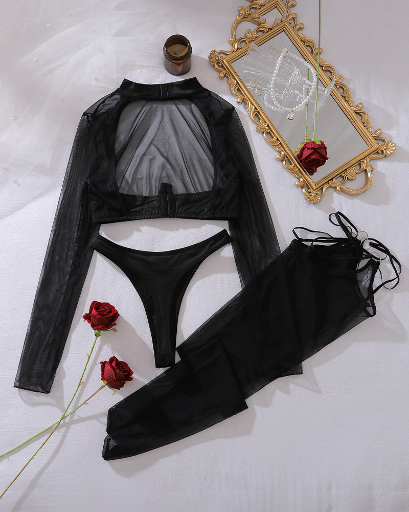 Black sheer mesh crop top, high-cut thong, and garter stockings set, flat lay