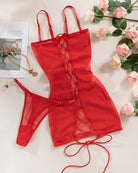 Backless lace-up slip dress in red with thin straps and sheer fabric panels
