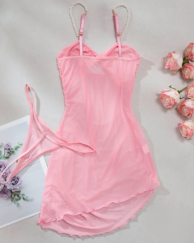Pink mesh slip dress with pearl straps and draped overlay skirt
