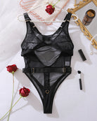 Black sheer double mesh bodysuit with cross-back straps, belt loops, and high-leg
