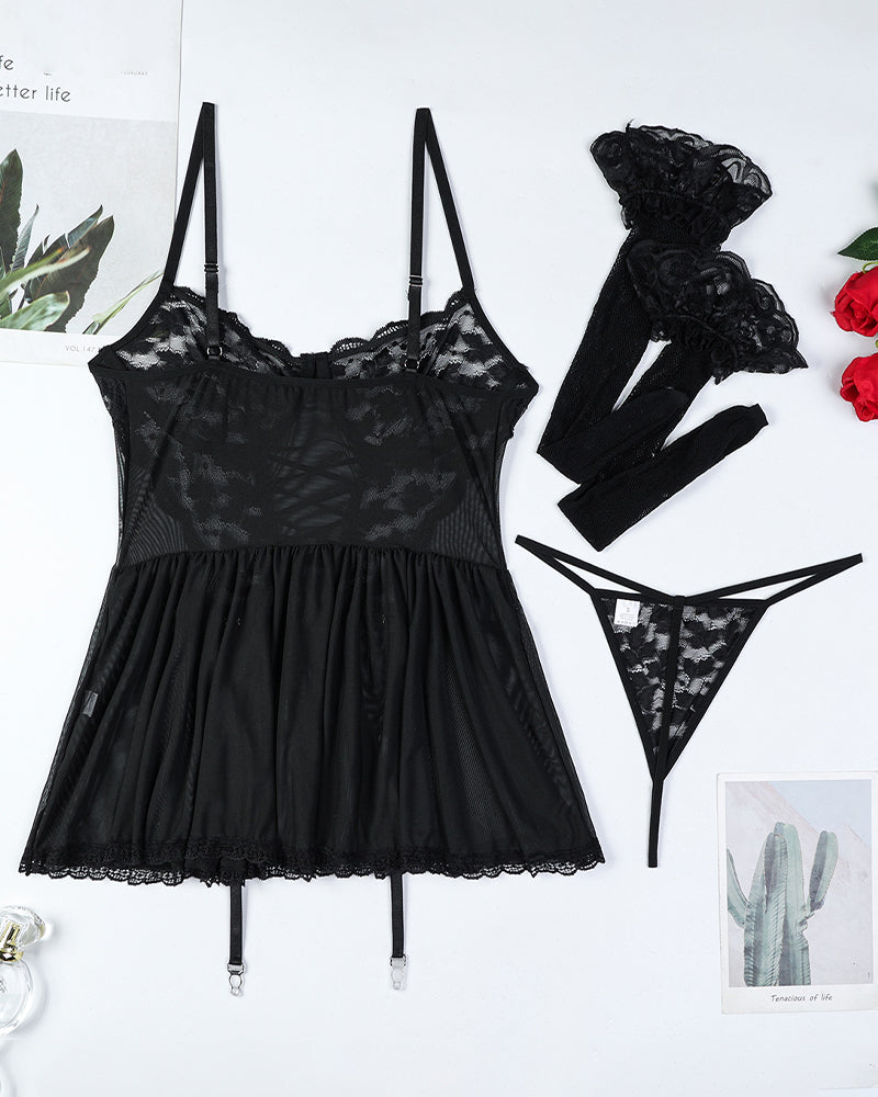 Black lace babydoll slip dress with matching stockings set, flat lay
