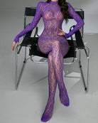 Purple sheer full-body bodystocking with long sleeves and footed legs, snake-skin pattern