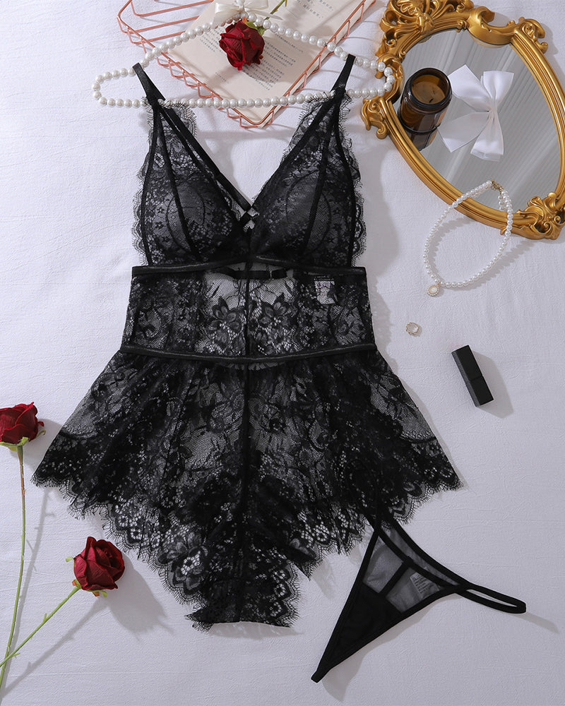Black lace deep V-neck mini bodysuit with layered ruffle hem and sheer floral cups