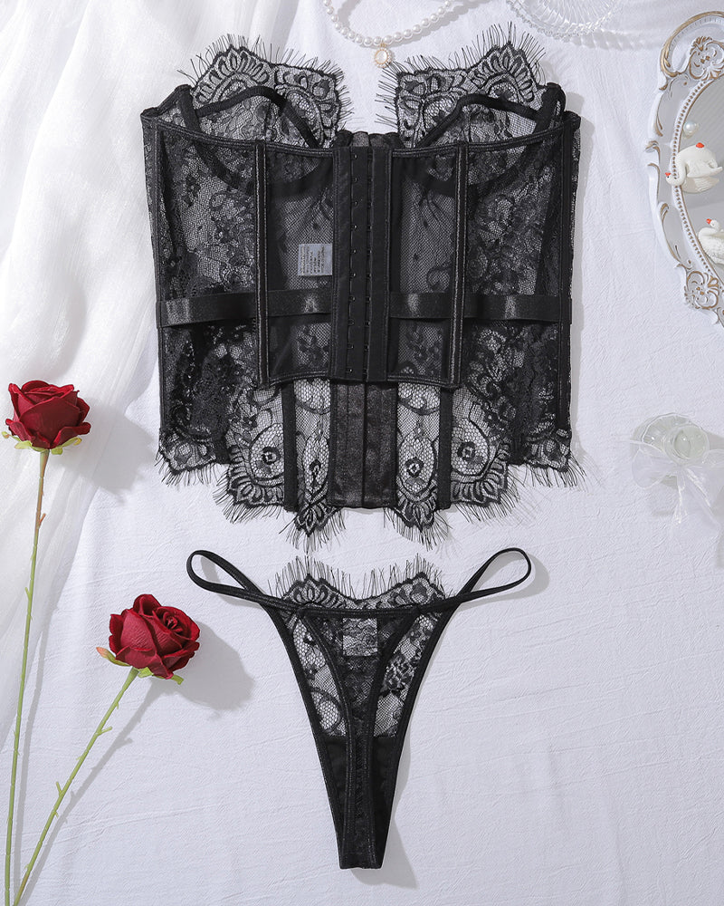 Black lace corset top back view with front hook detail and matching lace thong
