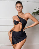 Black one-shoulder ruched asymmetrical mini dress with glitter texture and cutout side