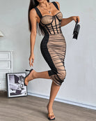 Black corset midi dress with sheer nude ruched panels and lattice straps