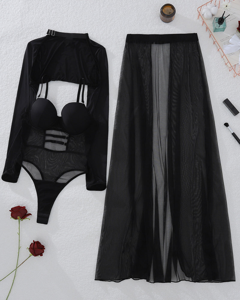Black mesh lingerie set with long-sleeve bodysuit and long sheer skirt, flat lay