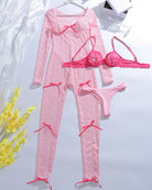 Pink lace long-sleeve top, matching bra and briefs, bow-tie details, set