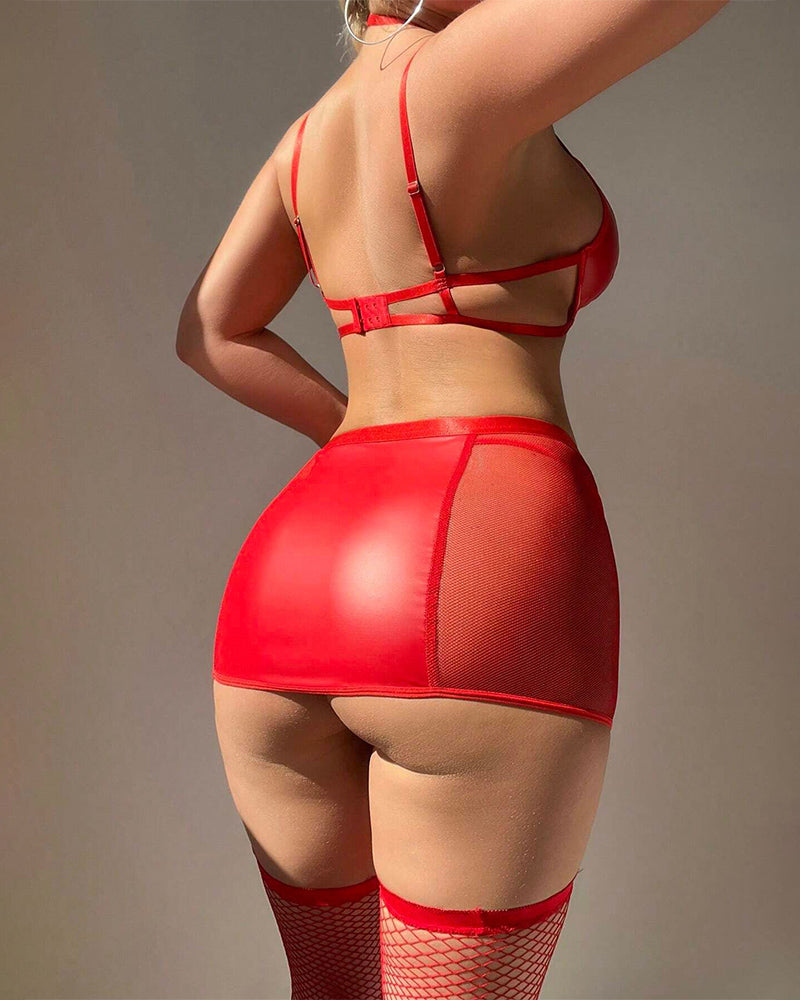 Red halter leather bra with strappy mini skirt, fishnet thigh-highs