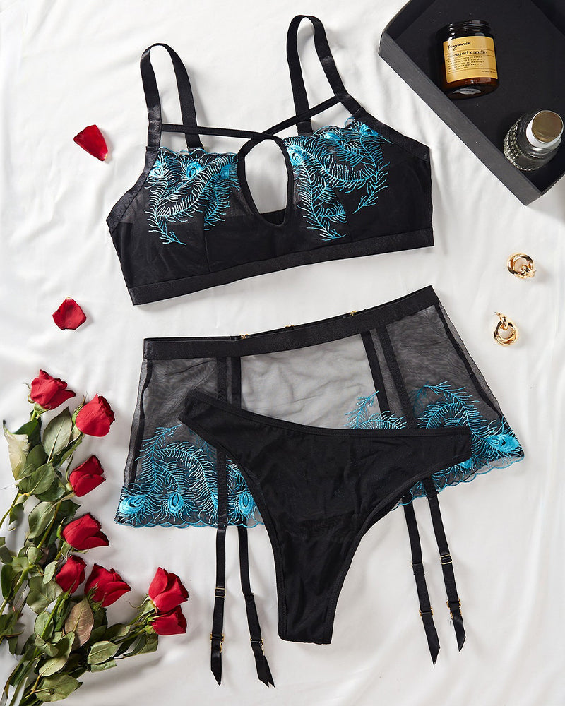 Black sheer bralette and panties set with turquoise feather embroidery and garter straps