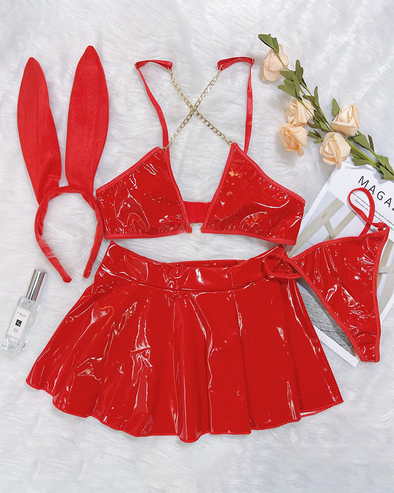 Red glossy PU leather bra and flared mini skirt set with gold chain straps, plus bunny-ear headband