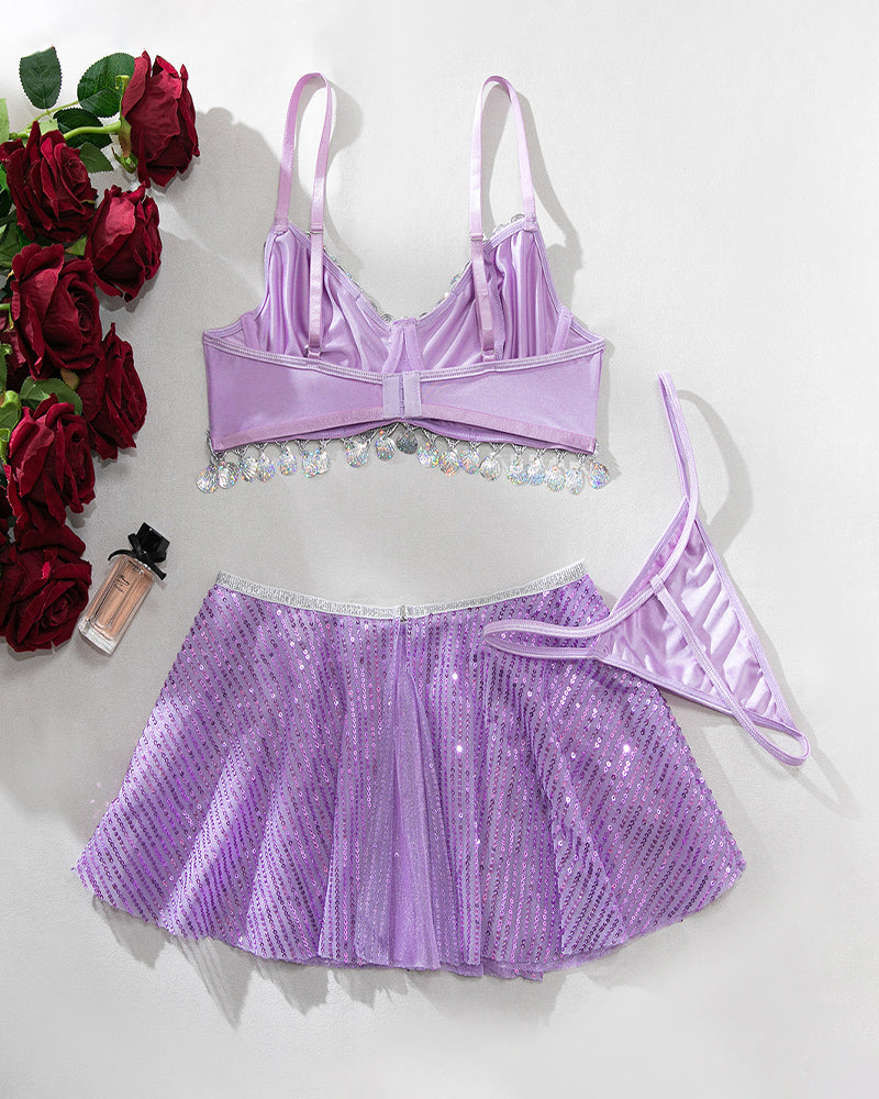 Purple bralette and sequin mini skirt set with adjustable straps and matching bottom