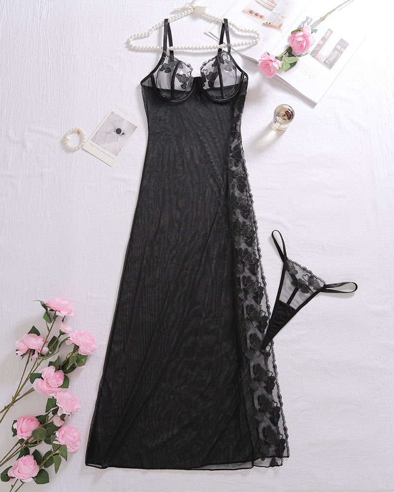 Black mesh sleep nightgown dress with lace hem, hanging on a hanger