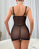 Black backless bodysuit with mesh back panel and adjustable shoulder straps